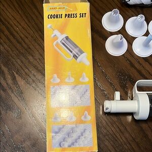 Vintage hand-held cookie press set